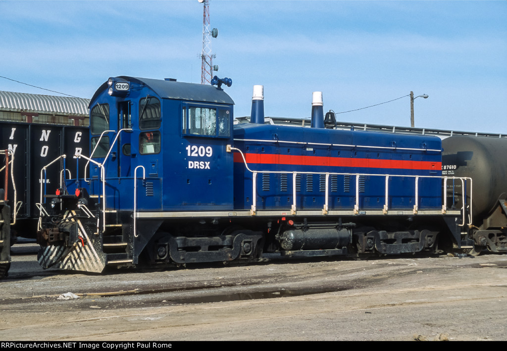 DRSX 1209, EMD SW9, ex BRC 523, enroute to CIRY seen here at Proviso Yard